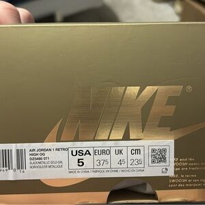 Nike Air Jordan 1 Retro High OG in Black and Gold